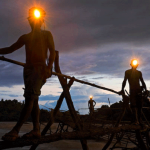 Fishermen clean and repair their “Li” gear during the monsoon. Unusual water level changes over past few years have resulted in unexpected fish migrations.